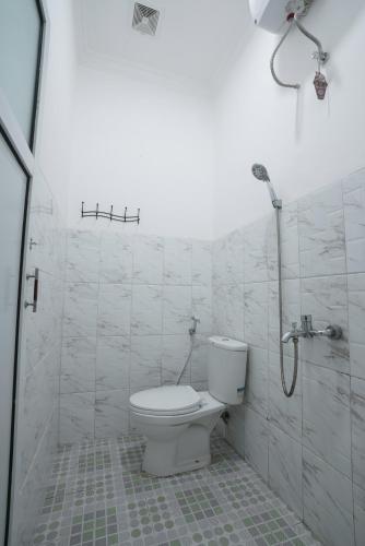 Ένα μπάνιο στο Sakura Guesthouse & Spa