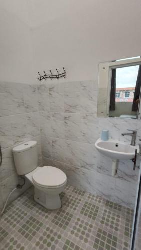 Ένα μπάνιο στο Sakura Guesthouse & Spa