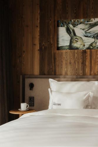 Postel nebo postele na pokoji v ubytování Hotel Recort