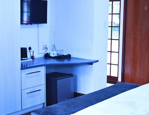 Una cocina o zona de cocina en Wood Valley