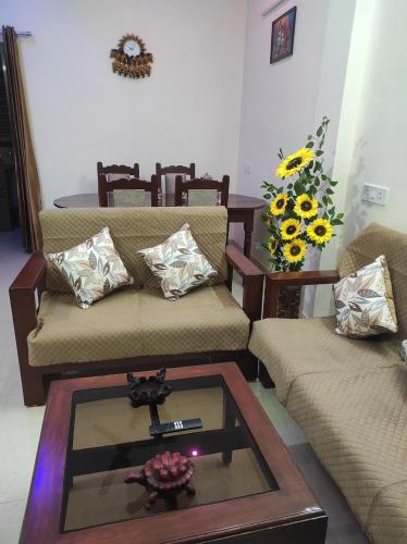 Posezení v ubytování Prabha Homestay