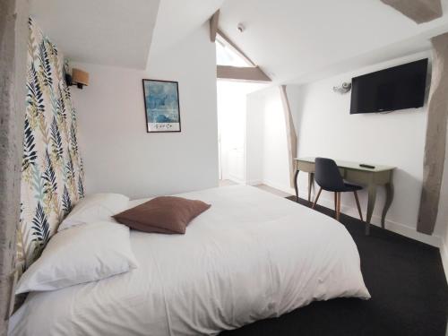 Postel nebo postele na pokoji v ubytování Les Cascades - Hôtel de Charme