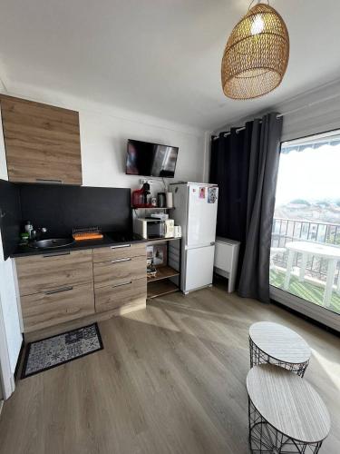 Studio à 50 m de la plage, wifi, climatisation 2HOU34