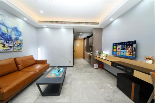 Ruang duduk di Boman Holiday Apartment Beijing Road Jie Deng Du Hui Branch - Free shuttle to Canton Fair