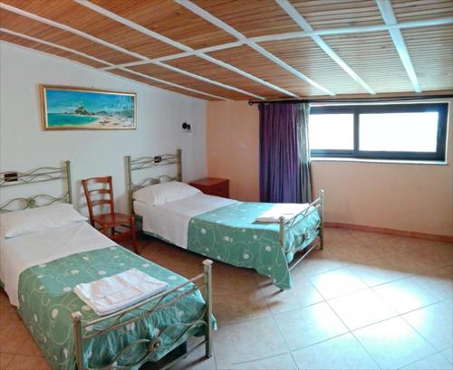 Tempat tidur dalam kamar di Locanda San Giorgio
