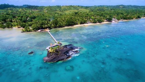 an island in the middle of the ocean at Libertalia Hotel in Sainte Marie