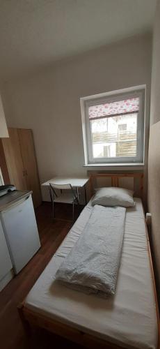 2-Rent Group Hostel Apartments EVE74にあるベッド