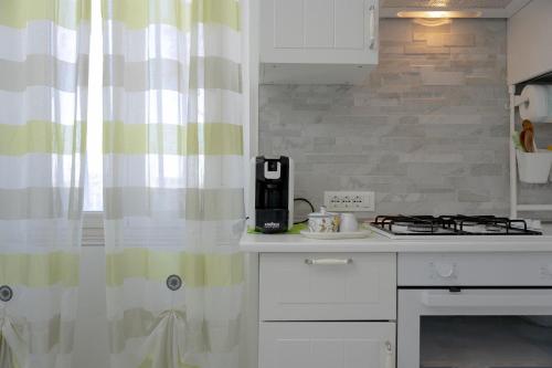 Η κουζίνα ή μικρή κουζίνα στο Aurora del Mare