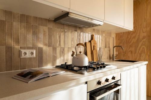 Dapur atau dapur kecil di Knus gezinsverblijf in Cosi Tiny House op de Veluwe
