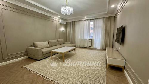 Televisor o centre d'entreteniment de Апартаменты в Центра Ташкента