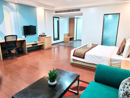 TV/Unterhaltungsangebot in der Unterkunft The Altruist Hotel Kharadi