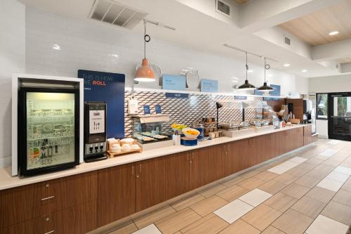 a store with a food counter in a building at Holiday Inn Express Hotel & Suites Coeur D'Alene I-90 Exit 11 by IHG in Coeur d'Alene