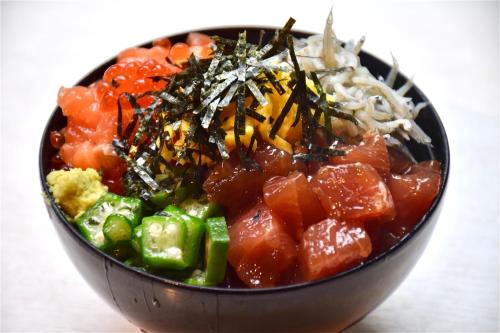 a bowl of food with vegetables and noodles at Dormy Inn Premium Kyoto Ekimae Natural Hot Spring in Kyoto