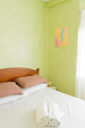 Katil atau katil-katil dalam bilik di Baroro Beach House LU