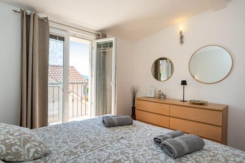 Posteľ alebo postele v izbe v ubytovaní ApartmentHouse Ivana