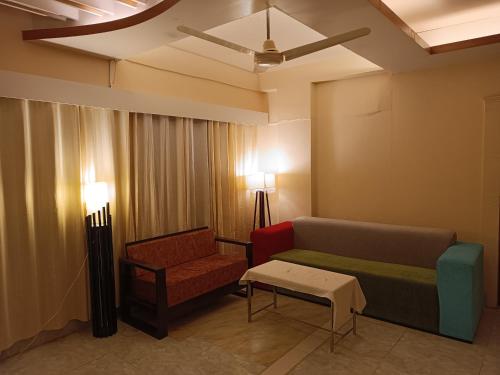 Ruang duduk di The Asteria Hotel Bogura