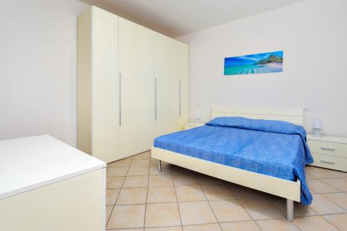 Ένα ή περισσότερα κρεβάτια σε δωμάτιο στο Residence Orizzonti app n 23