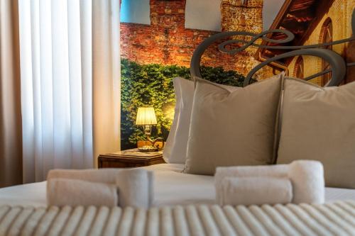 Letto o letti in una camera di PALAZZO RISTORI