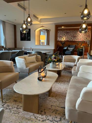 Un lugar para sentarse en Hotel Sonnenhof 3-Sterne-Superior