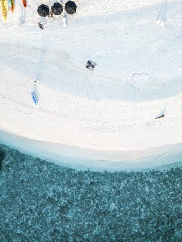 an aerial view of an island in the ocean at ARIA Beach, Ukulhas in Ukulhas