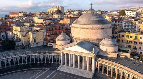 an aerial view of a building in a city at Chiaia Suites in Naples