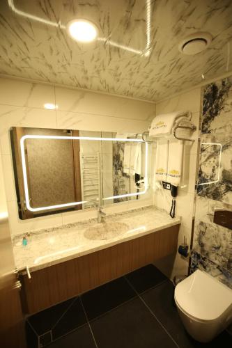Bilik mandi di Büpa delüxe hotel