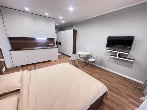 TV a/nebo společenská místnost v ubytování Paradise Apartments Solis Residence