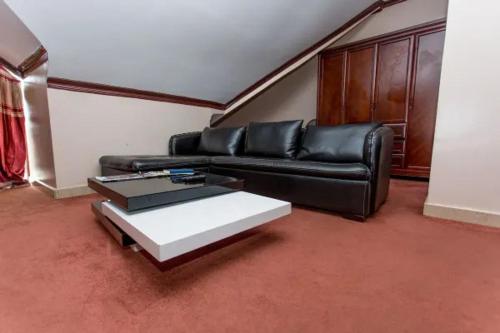 Zona de estar de Legend Hotel Kigali