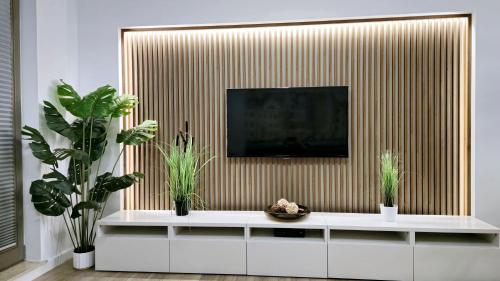 TV/trung tâm giải trí tại Gdańsk Szafarnia Waterlane SPA by Jacek Budek