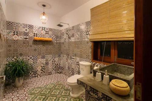 Koupelna v ubytování Nanu beach house Hội an