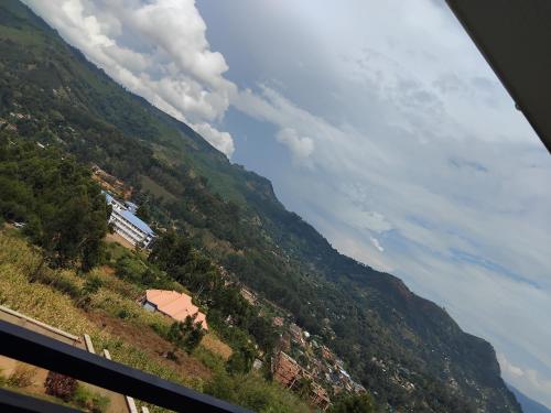 a view of a mountain from a train window at Sweetland view hotel in Lushoto