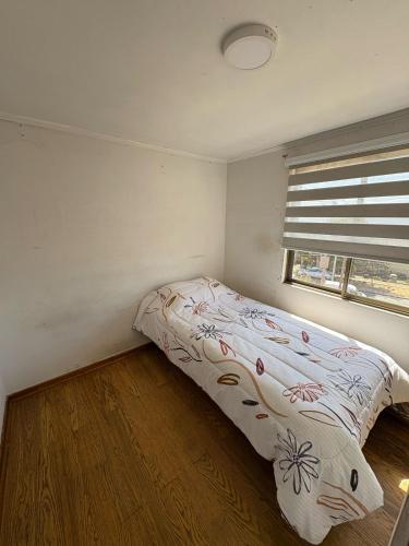 Ένα ή περισσότερα κρεβάτια σε δωμάτιο στο Hospedaje en viña del mar