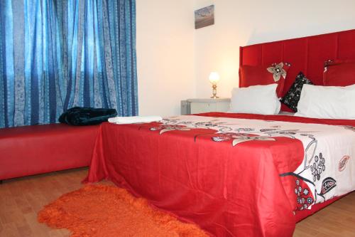 Ένα ή περισσότερα κρεβάτια σε δωμάτιο στο Peace Accommodation
