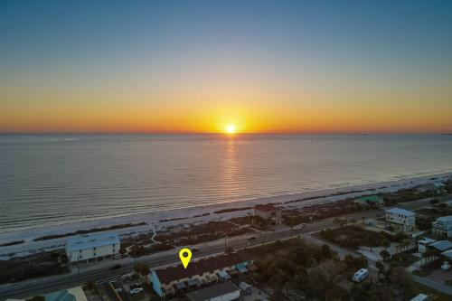 an aerial view of the beach at sunset at Good Times and Tan Lines in Saint Joe Beach