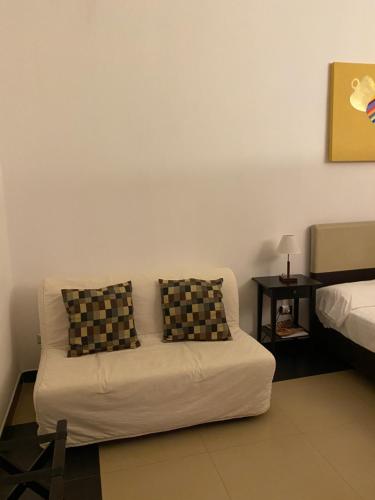 Ένα ή περισσότερα κρεβάτια σε δωμάτιο στο Hotel Plebiscito Aparthotel