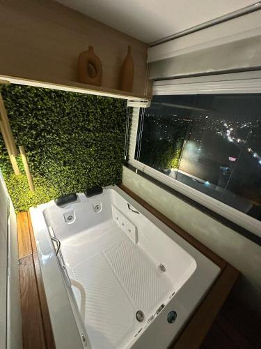 Koupelna v ubytování Refúgio romântico com Jacuzzi só sua! Espumante de cortesia!