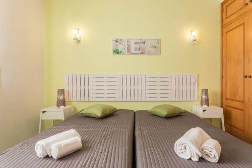 Säng eller sängar i ett rum på Apartment in Albufeira