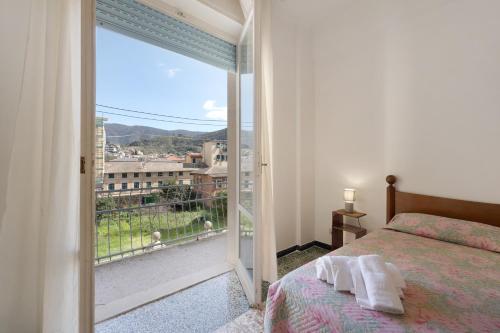 Ένα ή περισσότερα κρεβάτια σε δωμάτιο στο Casa Nadia