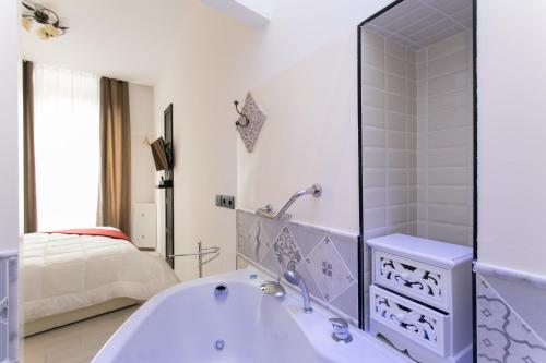 
Ein Badezimmer in der Unterkunft Aparthotel Dei Mercanti
