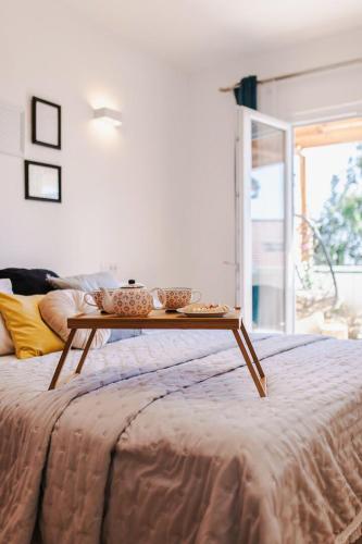 a coffee table sitting on top of a bed at San Francis in Hvar