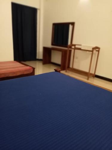 Postel nebo postele na pokoji v ubytování Royal Hotel