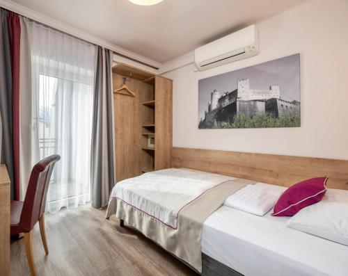 Posteľ alebo postele v izbe v ubytovaní HOTEL junior by MAX 70