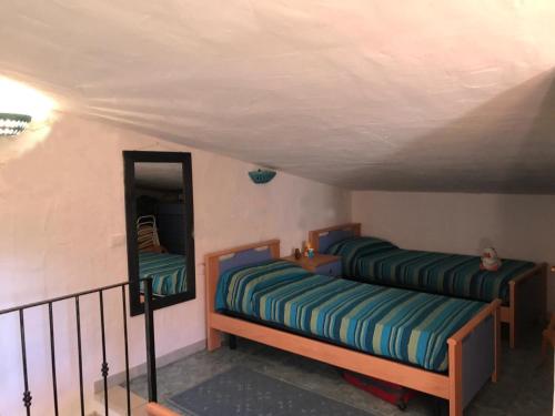 Postel nebo postele na pokoji v ubytování Tamerici House 1