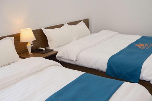 Katil atau katil-katil dalam bilik di Snow Hotel