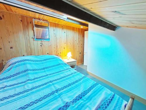 Ένα ή περισσότερα κρεβάτια σε δωμάτιο στο Appartement cosy avec 1 chambre - 4 couchages à Noirmoutier, proche du port et de la plage - FR-1-224B-207