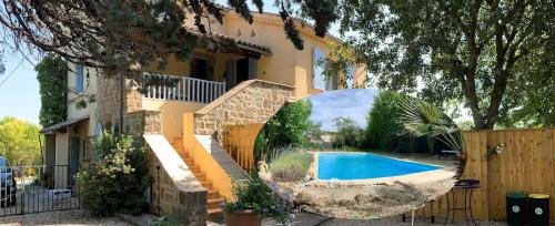 une maison avec un miroir en face d'une piscine dans l'établissement Le Mas g'Ardéchois, à Saint-Paul-le-Jeune