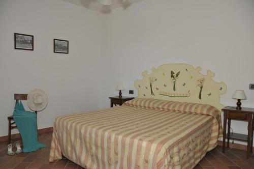 Postel nebo postele na pokoji v ubytování Agriturismo Renai e Monte II