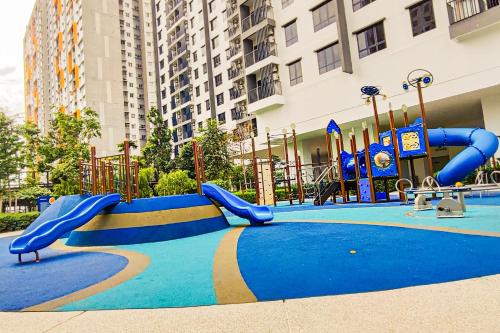 a playground with a slide in a building at Luxury Pool at M-Luna by HCK in Kuala Lumpur