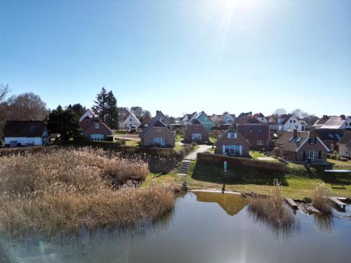 a view of a town with houses and a river at See in Sicht in Sternberg