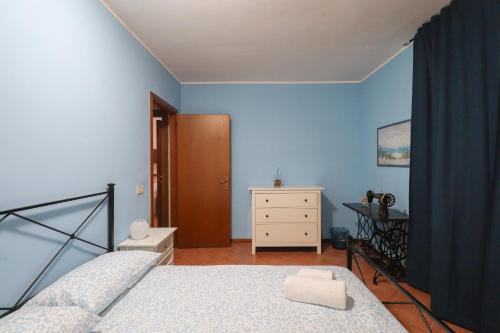 Ένα ή περισσότερα κρεβάτια σε δωμάτιο στο Elegante appartamento - 10min Lago di Bracciano